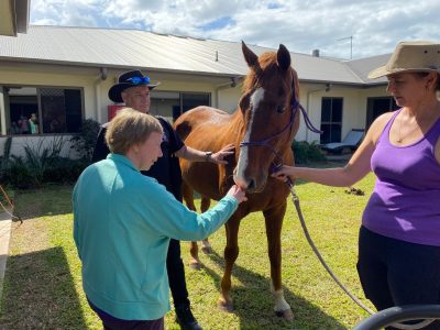 Caravonica Waters residents receive a horse visit
